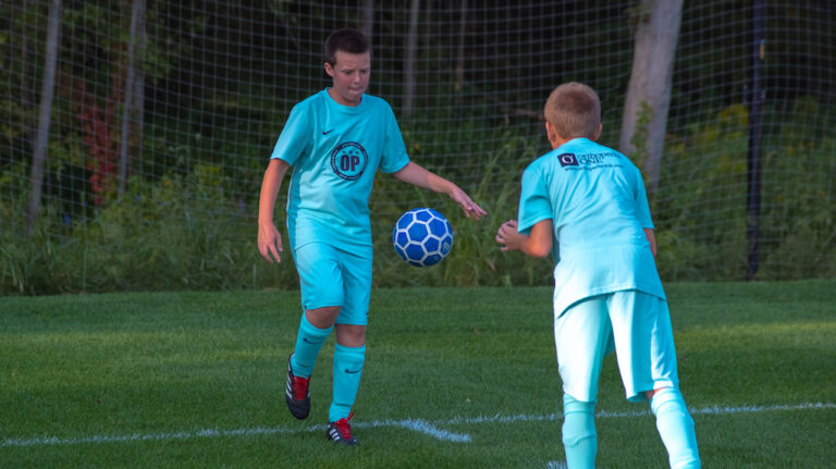Two young soccer players.